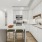Kitchen with island and white cabinetry
