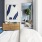 large windows brighten bedroom