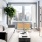 beautiful city views from well lit living room windows