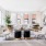 spacious living room surrounded by windows